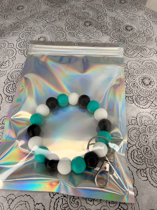 Teal, White & Black Silicone Wristlet